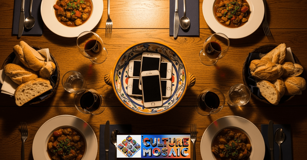 A family dinner table with smartphones placed in a central bowl to start a no-phone tradition.