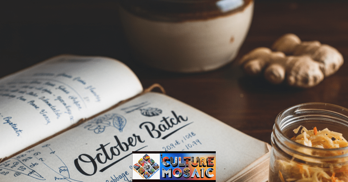 A fermentation legacy journal alongside a jar of finished sauerkraut, documenting ancestral preservation techniques.