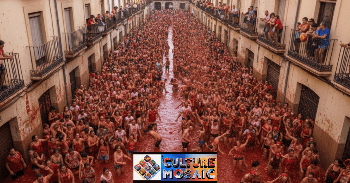 A crowd of people covered in red tomato juice during the La Tomatina festival in Spain.