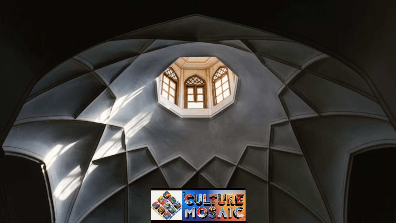 Dramatic low-angle view of an intricate vaulted stone ceiling, highlighting the structural engineering behind how did Gothic architecture begin.