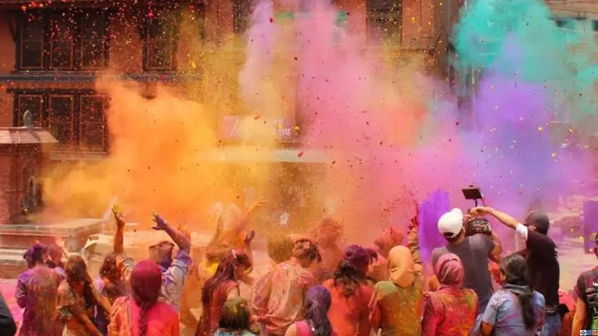 People celebrating Holi surrounded by vibrant colored powder and traditional architecture, showcasing the ancient roots of modern festivals.